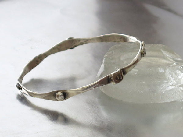 Thin Sterling Silver Stacking Bracelet.