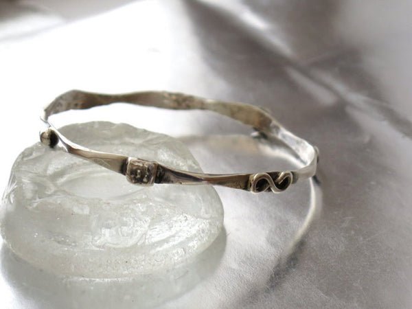 Thin Sterling Silver Stacking Bracelet.